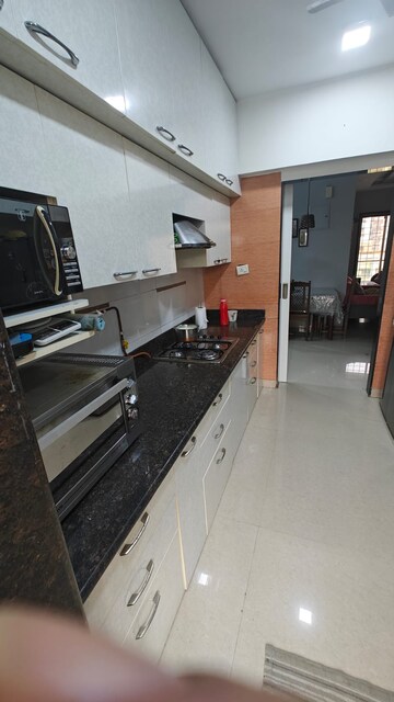 Kitchen in 3 BHK Apartment at Yashvasin CHS Ltd, Kharghar – for Sale