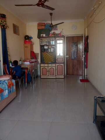 Living Room in 1 BHK Apartment at Mohan Tulsi Vihar, Badlapur West – for Sale