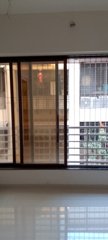 Building Lobby in 1.5 BHK Apartment at Matoshree Swaroop Celesta, Vile Parle East – for Sale