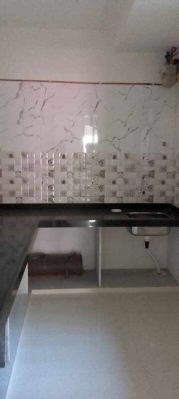 Kitchen in 1.5 BHK Apartment at Matoshree Swaroop Celesta, Vile Parle East – for Sale