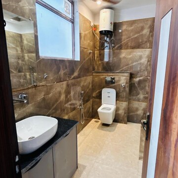 Bathroom in 3 BHK Apartment at Raja Park – for Sale