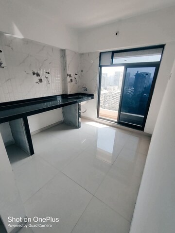 Kitchen in 2 BHK Apartment at Sunteck Maxxworld, Naigaon East – for Rent