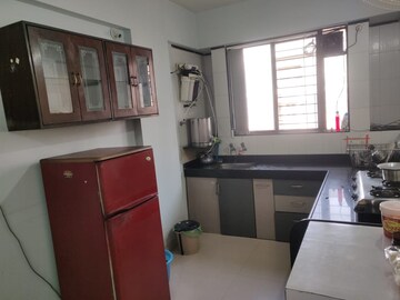 Kitchen in 2 BHK Apartment at Arun Sane Camellia, Baner – for Rent