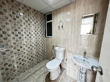Bathroom in 2.5 BHK Apartment at Mahagun Mantra II, Sector 10 Greater Noida – for Rent