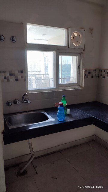 Kitchen in 1 BHK Apartment at Signature Orchard Avenue 2, Sector 93 – for Sale