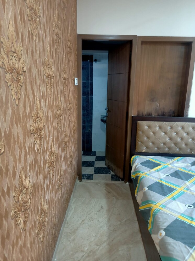 Bedroom, reliable-vasundhara-chs 2 Bedroom 540 Sq.Ft. Apartment In Goregaon West Mumbai 8132945