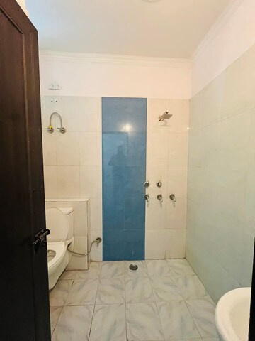 Bathroom in 3 BHK Builder Floor at Srishti Greenfield Homes, Green Fields Colony – for Sale