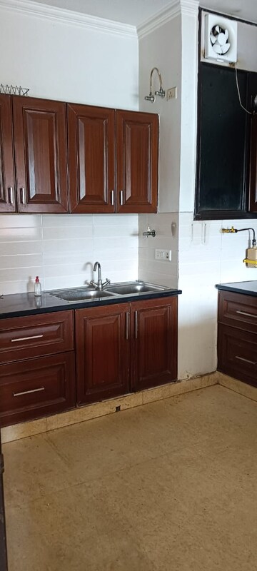Kitchen in 3 BHK Builder Floor at RWA Apartments Sector 30, Sector 30 – for Rent
