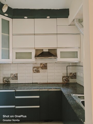 Kitchen in 2 BHK Apartment at Gaur City 2 - 14th Avenue, Sector 16c Greater Noida – for Rent
