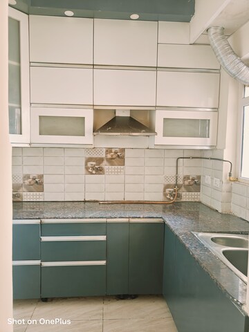 Kitchen in 2 BHK Apartment at Gaur City 2 - 14th Avenue, Sector 16c Greater Noida – for Rent