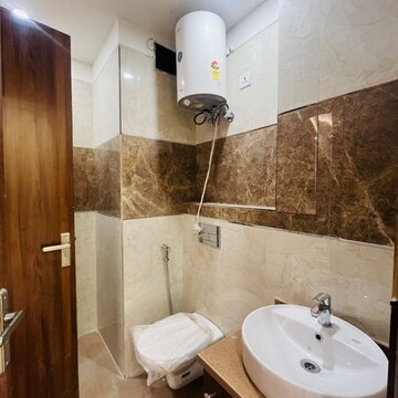 Bathroom in 4 BHK Builder Floor at Ansal API Esencia, Sector 67 – for Sale