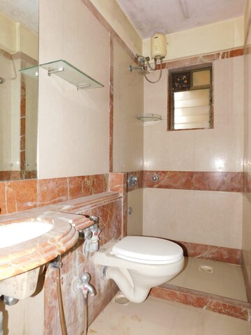Bathroom in 3 BHK Apartment at Basant Garden – for Sale