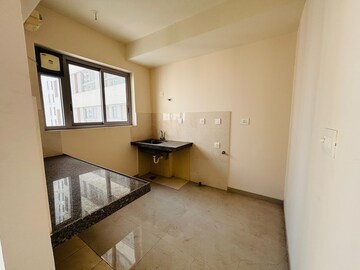 Kitchen in 2 BHK Apartment at Piramal Vaikunth, Balkum Pada – for Rent