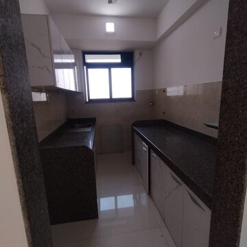 Kitchen in 2 BHK Apartment at Sunteck City Avenue 2, Mahatma Jyotibha Phule Nagar – for Rent