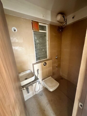 Bathroom in 1 BHK Apartment at Poddar Spraha Diamond, Chembur – for Rent