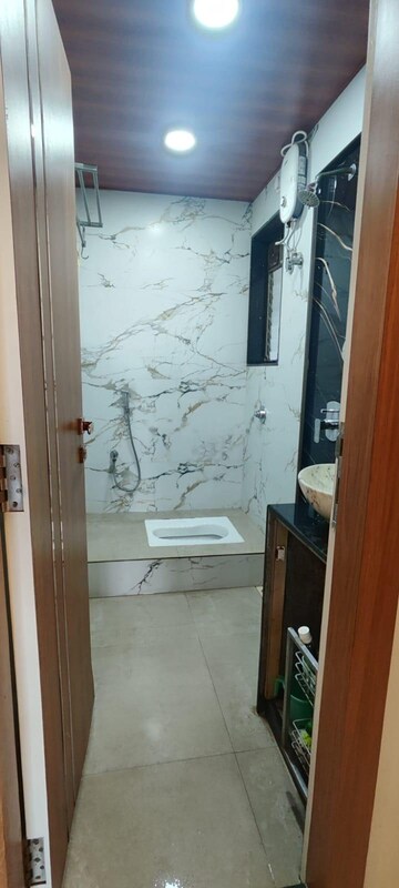 Bathroom in 2 BHK Apartment at MJ Shah Centrio, Govandi – for Rent