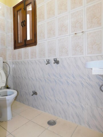 Bathroom in 2 BHK Builder Floor at Safdarjung Development Area – for Rent