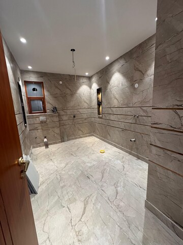 Bathroom in 4 BHK Builder Floor at Srishti Greenfield Homes, Green Fields Colony – for Sale