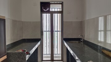 Kitchen in 2 BHK Apartment at Runwal My City Phase II Cluster 05, Dombivli East – for Rent