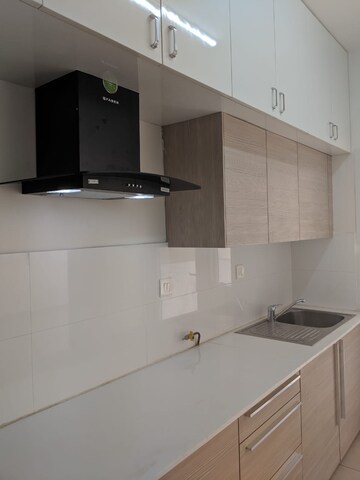 Kitchen in 2 BHK Apartment at Bhartiya Nikoo Homes, Thanisandra Main Road – for Rent