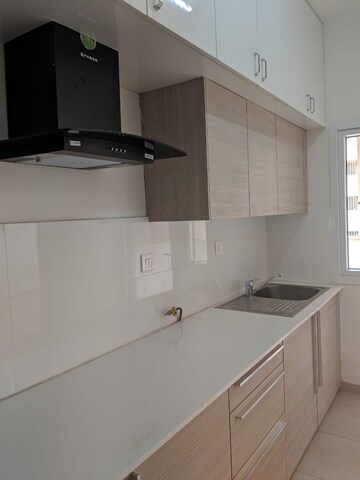 Kitchen in 2 BHK Apartment at Bhartiya Nikoo Homes, Thanisandra Main Road – for Rent