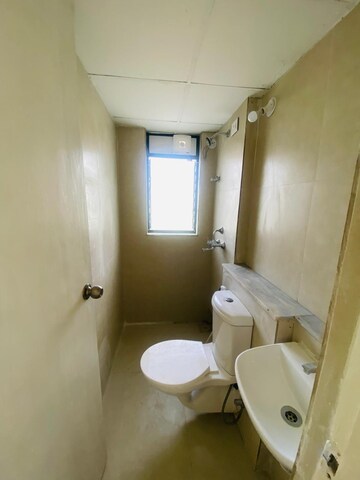 Bathroom in 2 BHK Apartment at Runwal Primrose, Dombivli East – for Rent