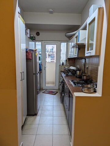 Kitchen in 3 BHK Apartment at Mahagun Moderne, Sector 78 – for Rent