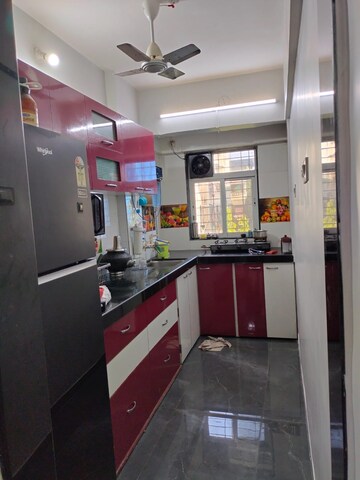 Kitchen in 3 BHK Apartment at Unique Twins Tower CHS, Sector 20 Kharghar – for Rent