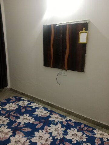 Bedroom in 1.5 BHK Builder Floor at Sector 18 – for Rent