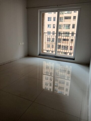 Room in 2 BHK Apartment at Rustomjee Azziano Wing E, Majiwada – for Sale