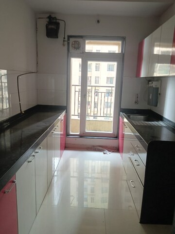 Kitchen in 2 BHK Apartment at Rustomjee Azziano Wing E, Majiwada – for Sale