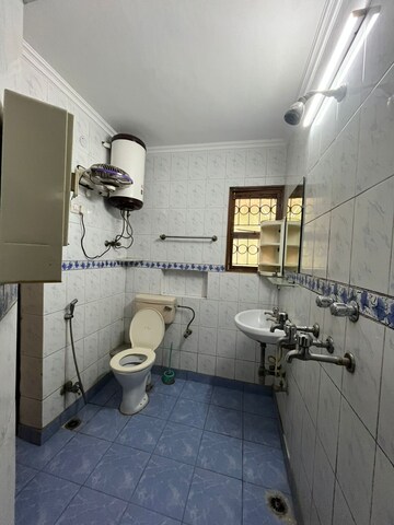 Bathroom in 3 BHK Apartment at Vasant Kunj – for Sale