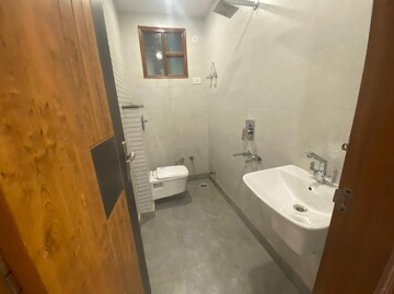 Bathroom in 3 BHK Builder Floor at Dwarka Mor – for Rent