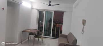 Living Room in 2 BHK Apartment at Rustomjee Urbania Azziano, Majiwada – for Rent