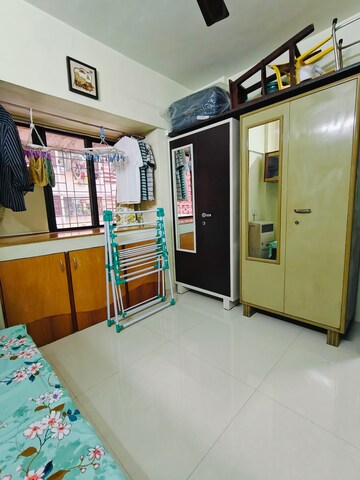 Bedroom in 2 BHK Apartment at Bhushan Park View CHS, Borivali West – for Sale