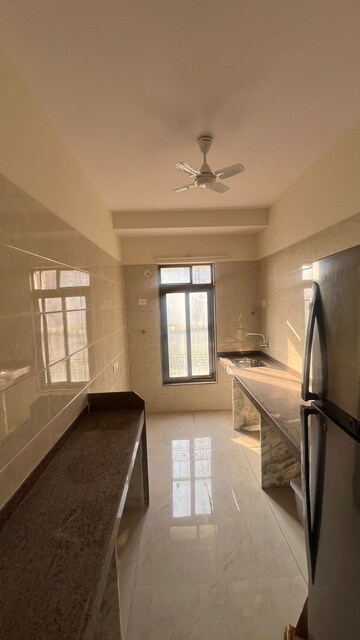 Kitchen in 2 BHK Apartment at Abrol Signature, Malad West – for Rent