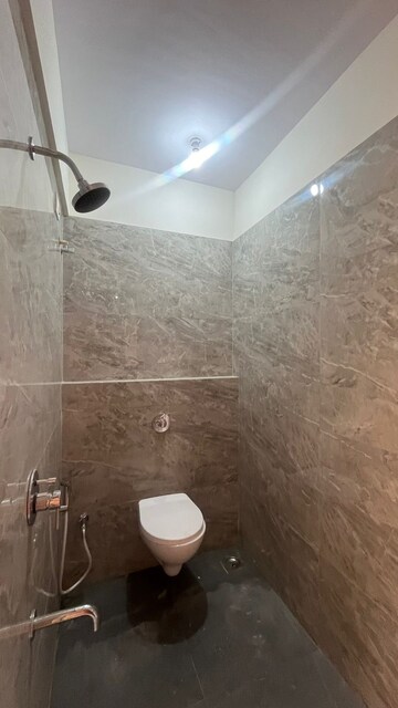 Bathroom in 2 BHK Apartment at Abrol Signature, Malad West – for Rent
