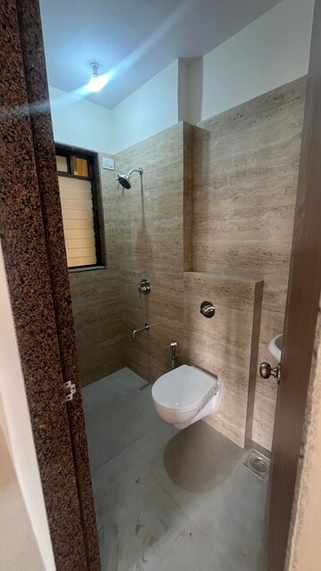 Bathroom in 2 BHK Apartment at Abrol Signature, Malad West – for Rent