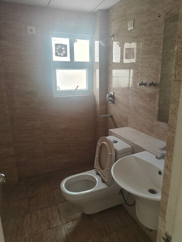 Bathroom in 3.5 BHK Apartment at Shree Vardhman Victoria, Sector 70 – for Rent