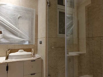 Bathroom in 3.5 BHK Builder Floor at Shivalik Colony – for Sale