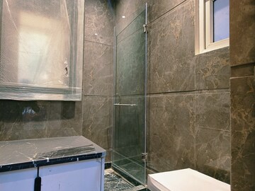 Bathroom in 3.5 BHK Builder Floor at Shivalik Colony – for Sale