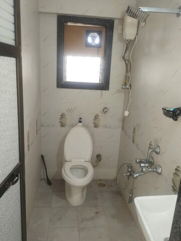 Bathroom in 1 BHK Apartment at N K Mayaank Heights, Borivali West – for Rent