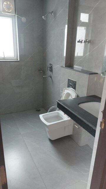 Bathroom in 3 BHK Apartment at Rishita Manhattan, Gomti Nagar – for Rent