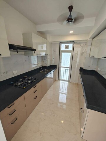 Kitchen in 2 BHK Apartment at Ruparel Ariana, Parel – for Rent