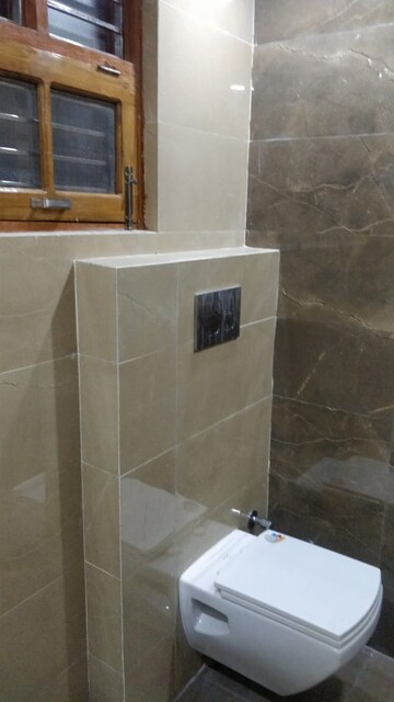 Bathroom in 3 BHK Apartment at Rishita Manhattan, Gomti Nagar – for Rent