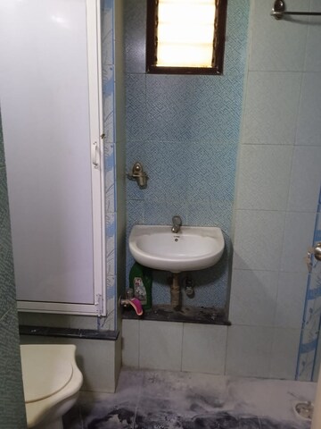 Bathroom in 2 BHK Apartment at Rag Megh Malhar, Goregaon East – for Rent