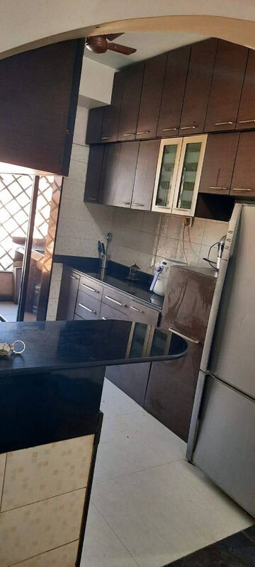 Kitchen in 2 BHK Apartment at Swapnalok Towers, Malad East – for Rent