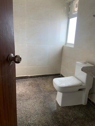 Bathroom in 2 BHK Apartment at Devika Skypers, Raj Nagar Extension – for Sale