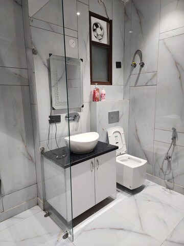 Bathroom in 4 BHK Builder Floor at Niti Khand I – for Rent