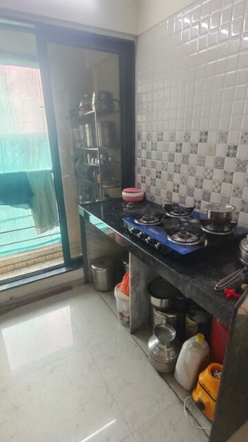 Kitchen in 1 BHK Apartment at Ornate Rise, Themghar – for Sale